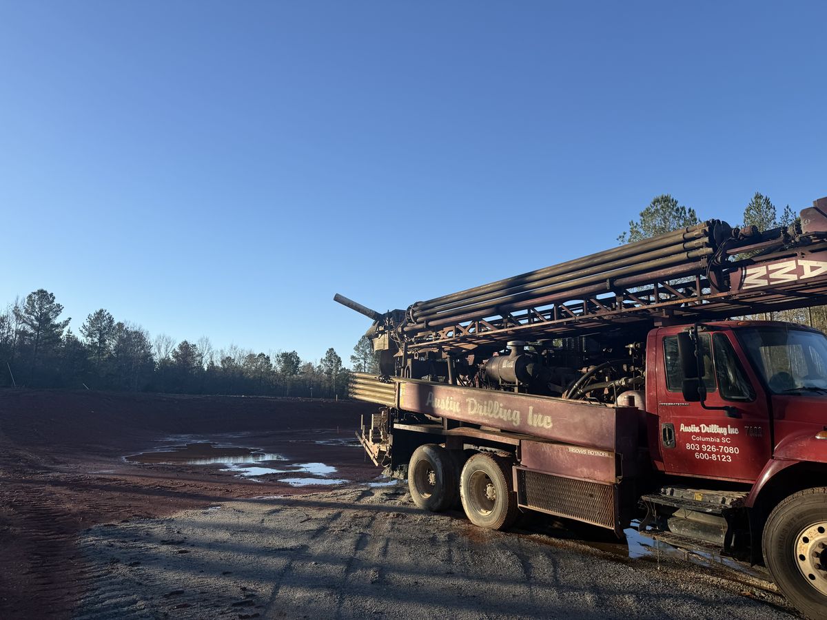 Austin Drilling rig on an open field for an irrigation well